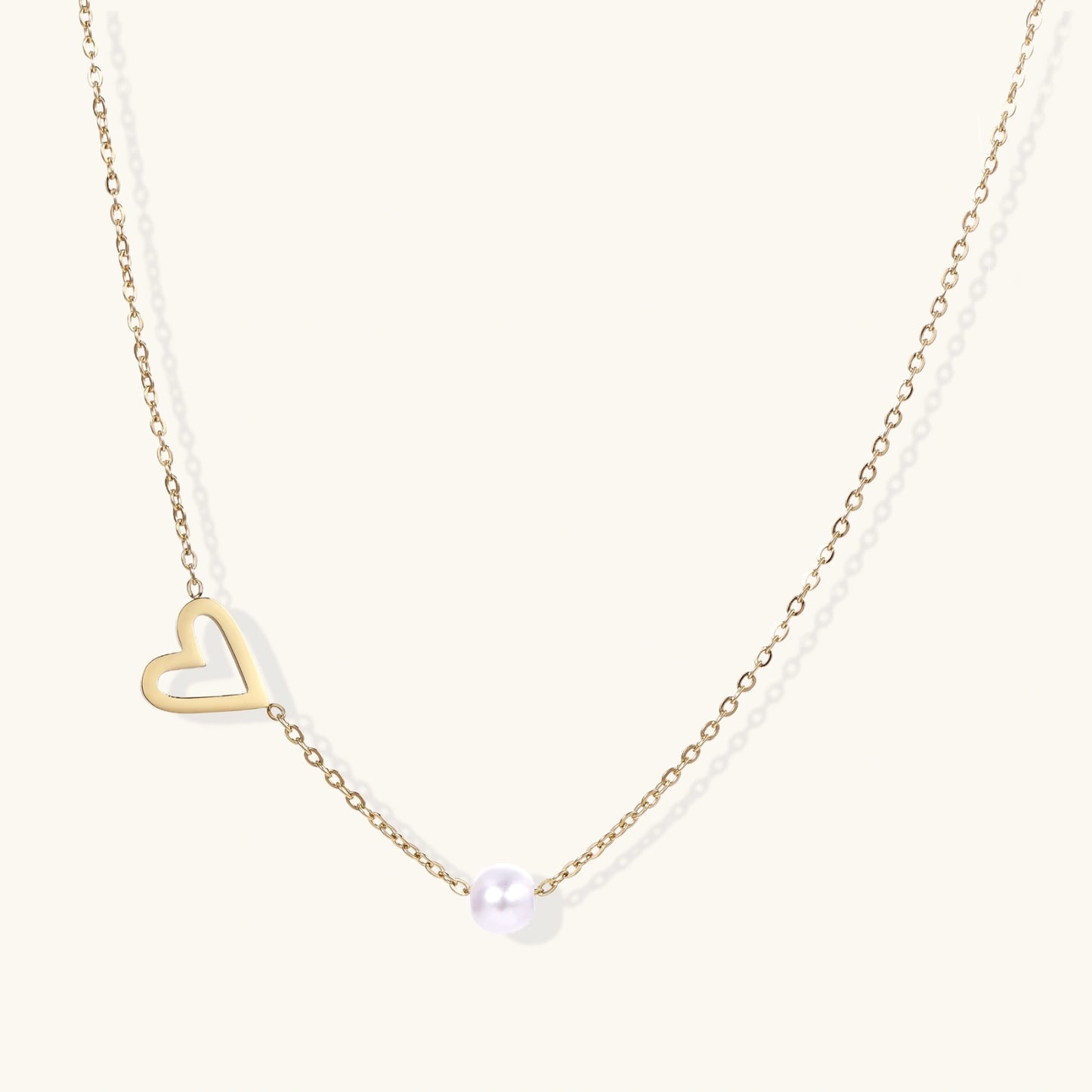 Pearl Heart Embrace Necklace by FANCY CHAPTER
